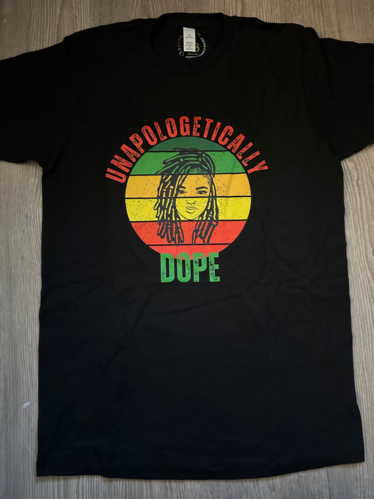 Unapologetically in Red text Dope in green text with green, orange, yellow, red retro circle with dreadlocks lady on top on a black shirt. Melanin Apparel.